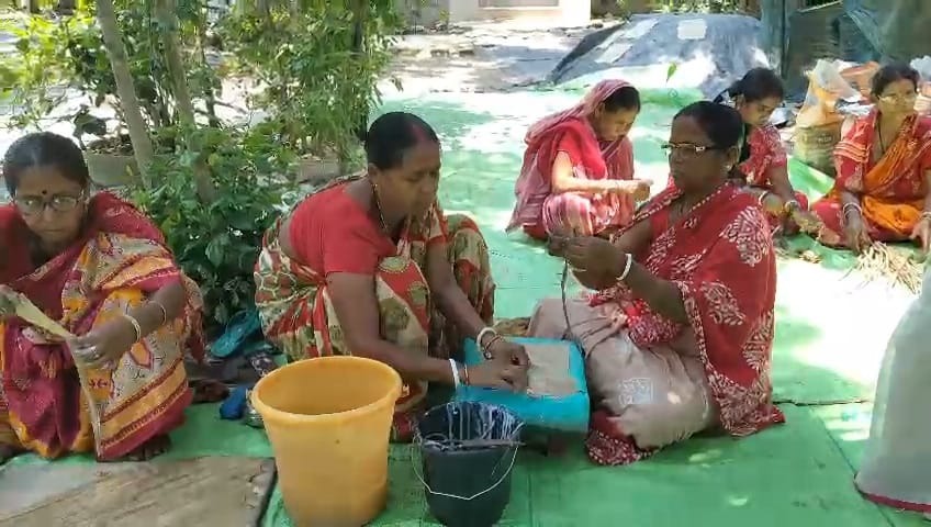 Women artisans participating in a skill development workshop, learning modern craft techniques for better livelihood opportunities.